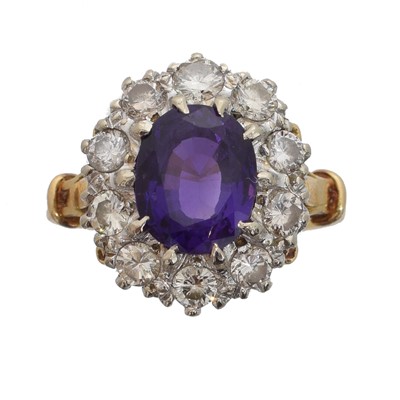 Lot 148 - An amethyst and diamond cluster ring.