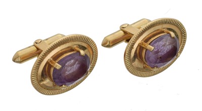 Lot 161 - A pair of amethyst cufflinks.
