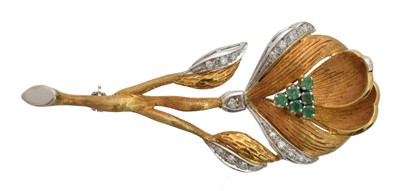 Lot 17 - An 18ct gold emerald and diamond floral brooch.