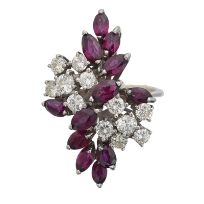 Lot 97 - An 18ct gold ruby and diamond cluster ring.