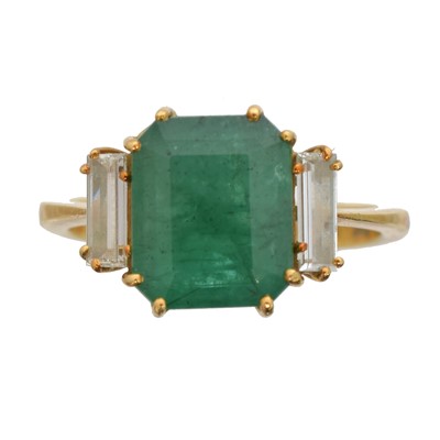 Lot 127 - An 18ct gold emerald and diamond dress ring.