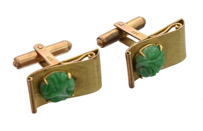 Lot 163 - A pair of jade cufflinks.