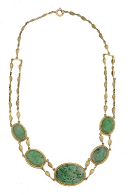 Lot 75 - A jade necklace.