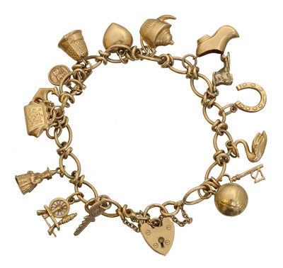 Lot 24 - A 9ct charm bracelet.
