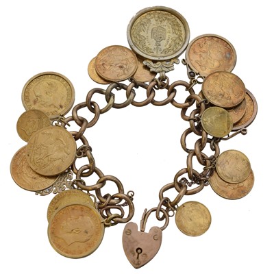 Lot 29 - A coin charm bracelet.