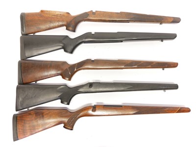 Lot 423 - Five rifle stocks, one marked Tikka.