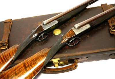 Lot 307 - Trulock and Harriss cased pair of 12 bore side...