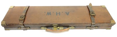 Lot 388 - Leather oak and brass shotgun case, to...