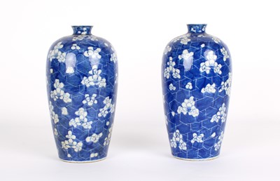 Lot 108 - A Pair of Japanese Blue and White "Cracked Ice" Vases
