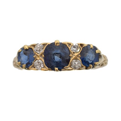 Lot 123 - A late Victorian 18ct gold sapphire and diamond dress ring.