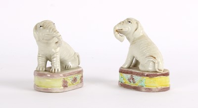 Lot 19 - A Near Pair of Chinese Porcelain Miniature Model Elephants