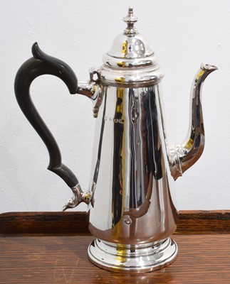 Lot 107 - A George V silver hot water jug.