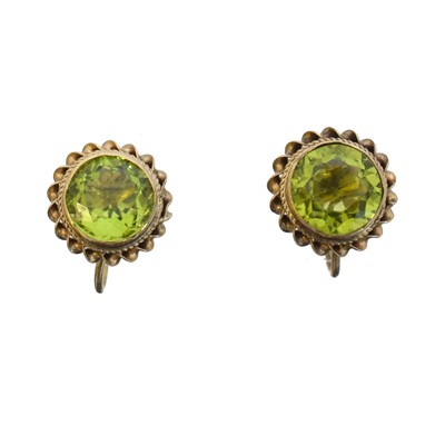 Lot 37 - A pair of peridot stud earrings.
