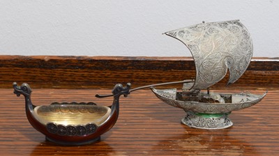 Lot 112 - Two silver and enamel model boats.