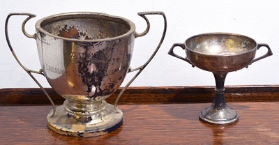 Lot 114 - Two silver twin handled cups.