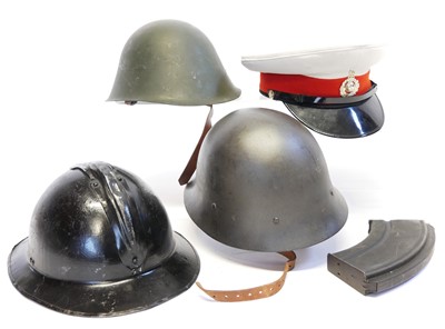 Lot 215 - Hungarian, Soviet and French helmet, also a...