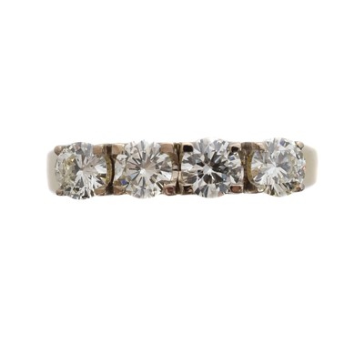 Lot 126 - A diamond four stone ring.