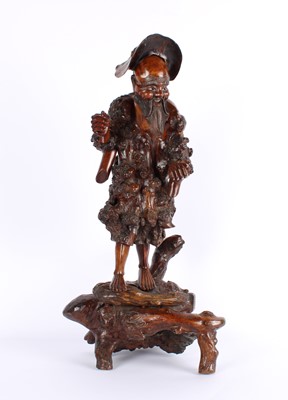 Lot 23 - A Large Chinese Rootwood Carving of Shou Lao (The God of Longevity)