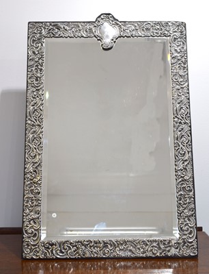 Lot 91 - A late Victorian silver fronted mirror by Goldsmiths.