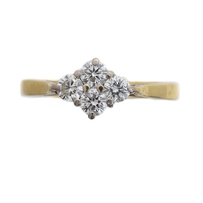 Lot 105 - An 18ct gold diamond dress ring.