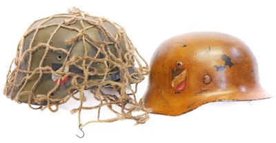 Lot 201 - Two German helmets, probably original but...