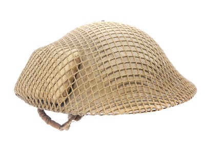 Lot 204 - British WWII MkII helmet and liner with net...