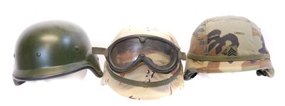 Lot 205 - Three modern plastic helmets and liners, two...