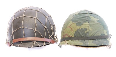 Lot 207 - US M1 type helmet and liner, with net cover...