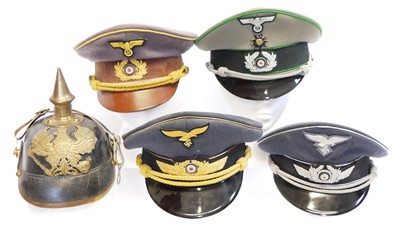 Lot 210 - Four reproduction German Third Reich peaked...