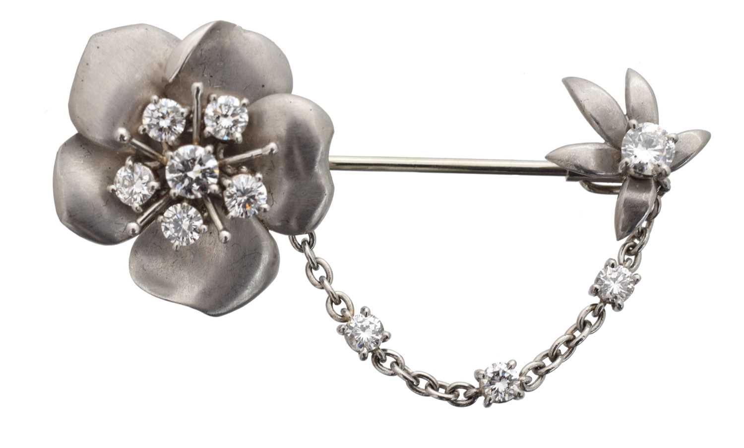 Lot 7 - A 1980s diamond jabot pin by Cartier.