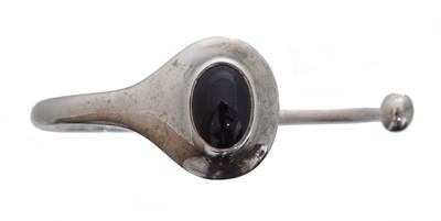 Lot 20 - A silver onyx bangle by Georg Jensen, no. 269L.