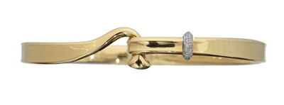 Lot 31 - An 18ct gold diamond 'Torun' bangle by Georg Jensen.