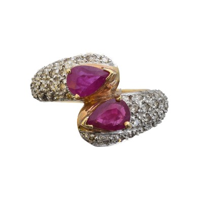Lot 80 - A 9ct gold ruby and diamond crossover ring.