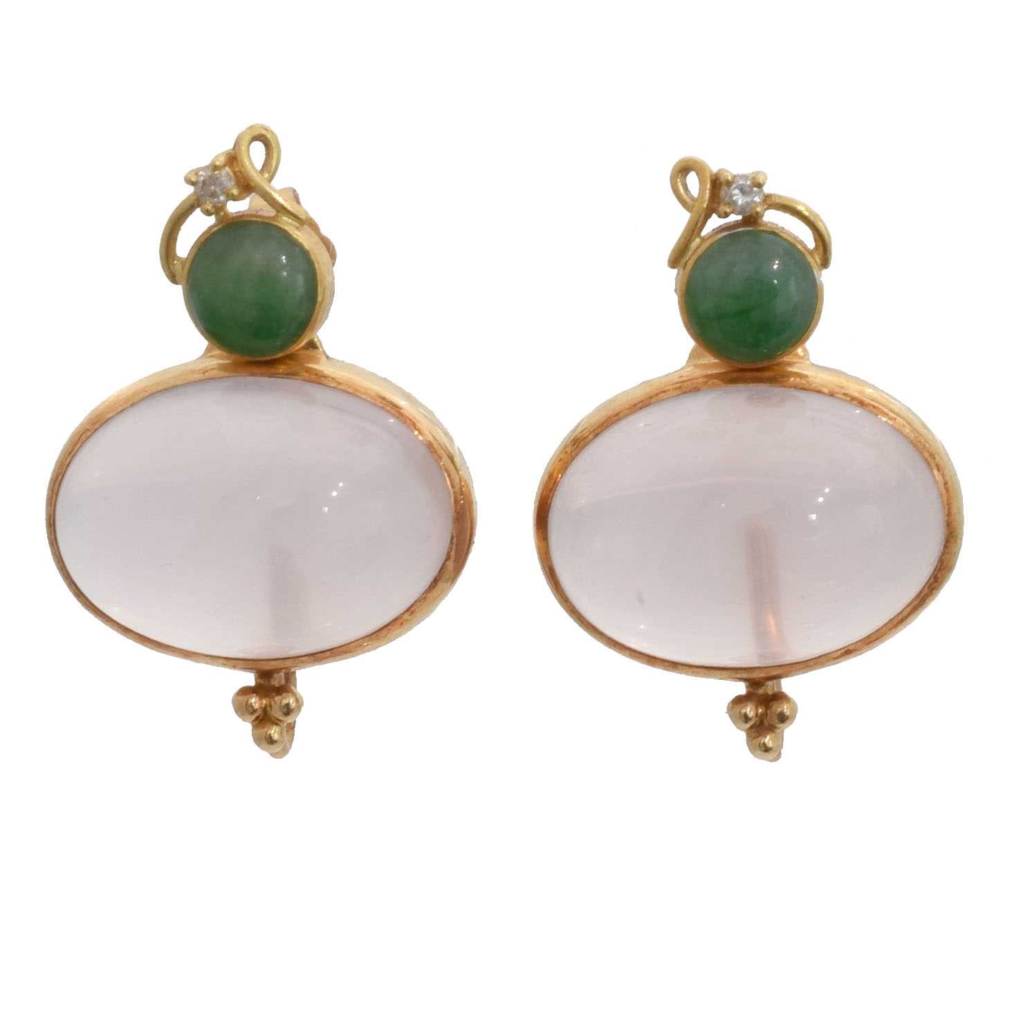 Lot 42 - A pair of jade earrings.