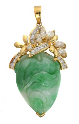Lot 49 - A jade and diamond pendant.