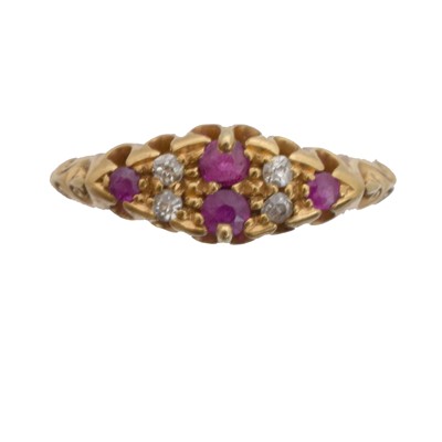 Lot 81 - An 18ct gold ruby and diamond dress ring.