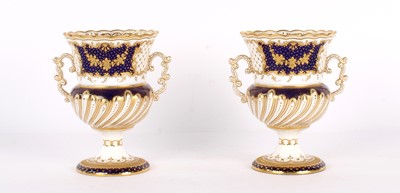 Lot 42 - A Pair of 19th Century Porcelain Twin-Handled Urns by Copeland