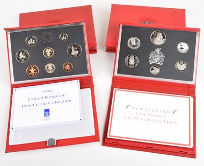 Lot 22 - Three Royal Mint 1990 Proof Coin Collections and a 1990 New Zealand Proof Coin Collection (4).
