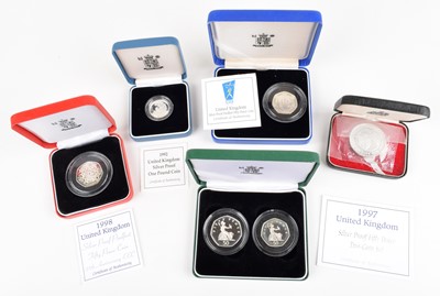 Lot 28 - Thirty cased Royal Mint Silver Proof coins and coin sets (30).