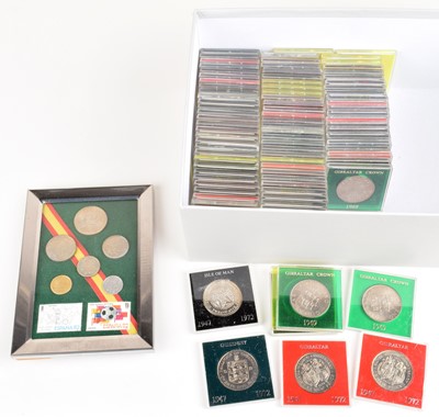 Lot 5 - An assortment of 89 cased modern Crowns and a 1982 Spain World Cup Commemorative Coin set.