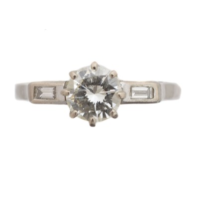 Lot 64 - An early 20th century diamond solitaire ring.