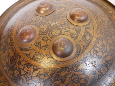 Lot 170 - Dhal shield, with four bosses, decorated with...
