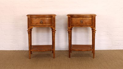 Lot 174 - A Pair of Walnut Bowfront Bedside Tables from the "Spire" Range by Frank Hudson Ltd.