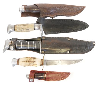 Lot 135 - Five hunting / outdoors knives, four with...