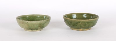 Lot 60 - A Near Pair of Chinese Ming Dynasty Celadon Shallow Bowls