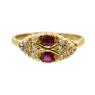 Lot 110 - An Edwardian style yellow metal ruby and diamond navette ring