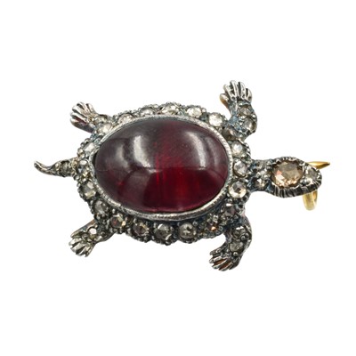 Lot 20 - A garnet and diamond 14ct gold and silver tortoise brooch