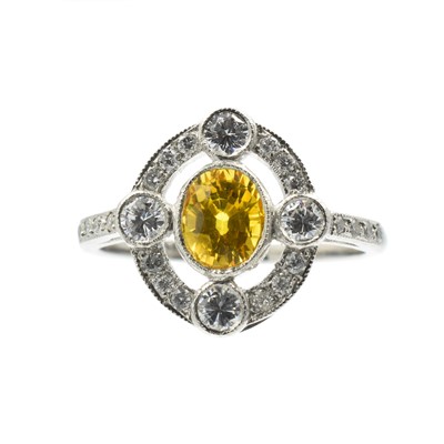 Lot 8 - A yellow sapphire and diamond art deco ring set in platinum