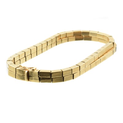 Lot 21 - An 18ct gold double row block link bracelet