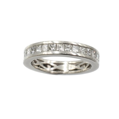 Lot 259 - A diamond and platinum eternity ring, by David Robinson